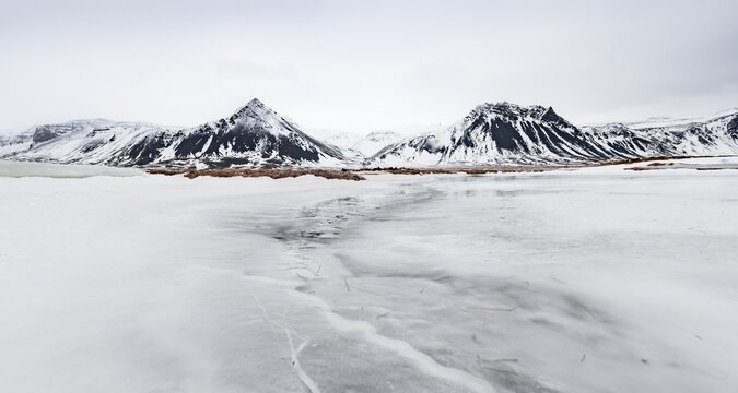 Icy landscape, volcanic black mountains with snow, Vesturland, West Iceland, Iceland