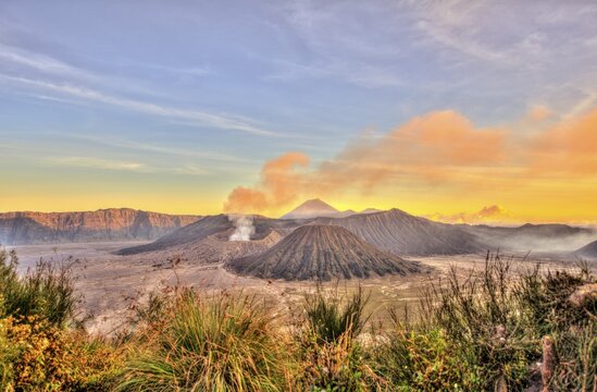 Smoking volcano Gunung Bromo, Mount Batok in front, Mount Kursi at back, Mount Gunung Semeru, Bromo Tengger Semeru National Park, Java, Indonesia