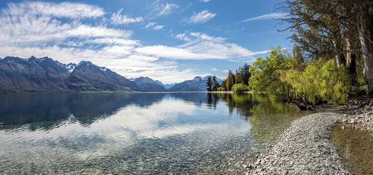 Mountains reflected in the lake, Lake Wakatipu, Otago, South Island, New Zealand
