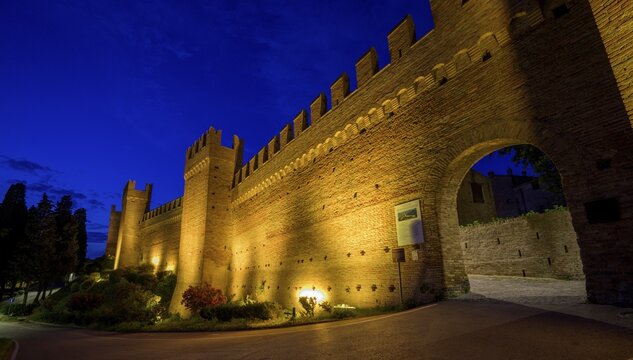 Illuminated city wall of, Gradara, province of Pesaro and Urbino, Italy