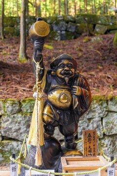 Golden statue, lucky charm, Nikkō, Japan