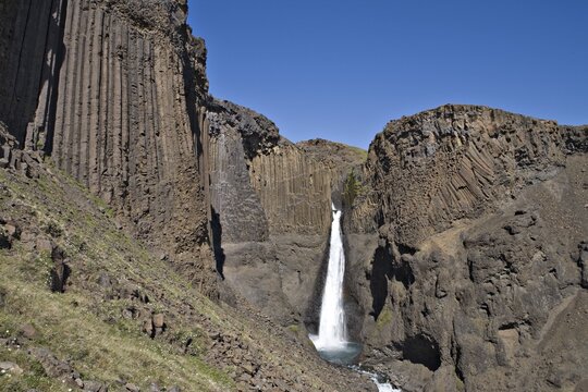 Basalt columns lining Litlanesfoss Waterfall, Egilssta&eth;ir, Iceland, Atlantic Ocean