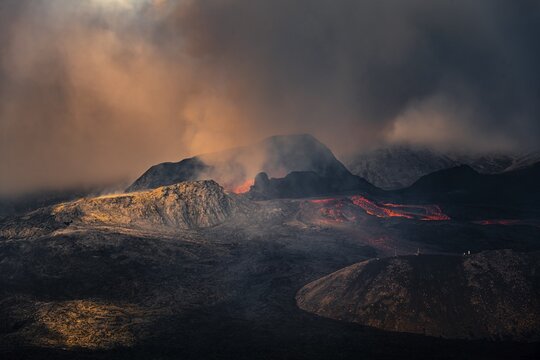 Erupting volcano with lava fountains and lava field, crater with erupting lava and lava flow, Fagradalsfjall, Kr&yacute;suv&iacute;k volcano system, Reykjanes Peninsula, Iceland