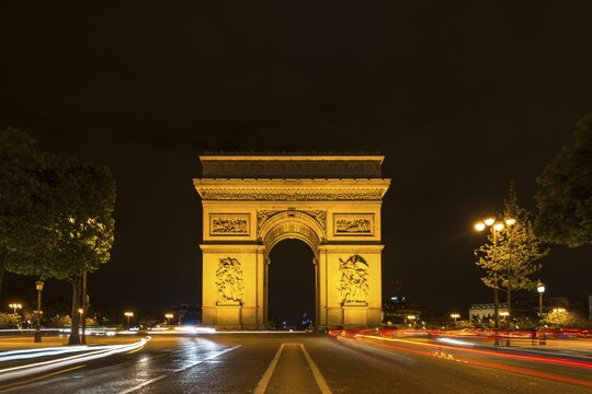 Triumphal Arch, Arc de Triomphe at night, trails of light, Place Charles de Gaulle, Paris, Ile-de-France, France