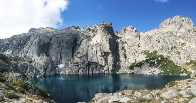 Mountain lake Lac de Capitello surrounded by steep faces, Restonica high valley, Corte, Haute-Corse, Corsica, France