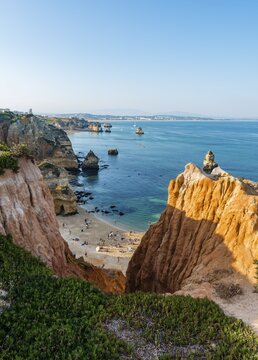 Ponta da Piedade, beach Praia do Camilo, rugged rocky coast of sandstone, rock formations in the sea, Algarve, Lagos, Portugal