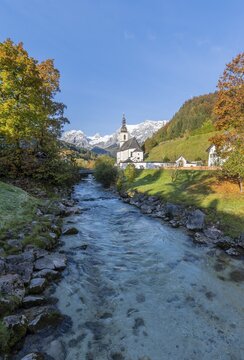 Parish church St. Sebastian with Ramsauer Ache, Ramsau, Berchtesgaden area, Bavaria, Germany