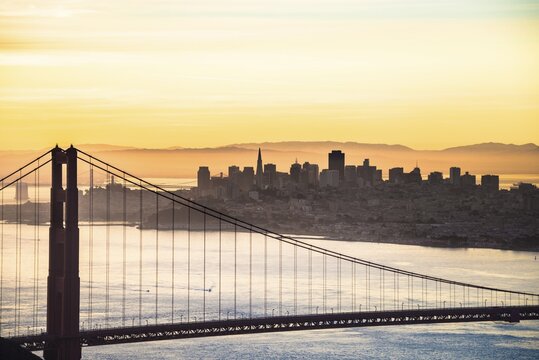 Golden Gate Bridge, Skyline of San Francisco at sunrise, San Francisco, California, USA