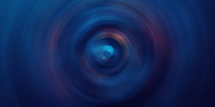 Abstract circular motion blur background with deep blue gradients and subtle light rings creating concentric tunnel effect.