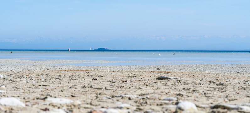 Exposed lakebed displaying low water levels at lake constance