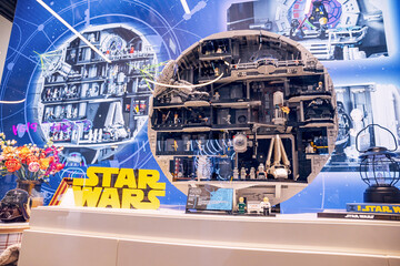 Naklejka premium 19 October 2025, Belgrade, Serbia: Detailed LEGO Star Wars Death Star toy model showing multiple interior scenes with minifigures on an exhibition stand