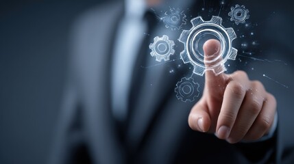Fototapeta premium Businessman interacting with virtual gear mechanism