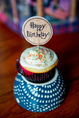 Naklejka premium A birthday cupcake decorated with a Harry Potter style 
