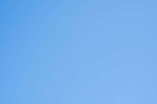 Clear blue sky background gradient.