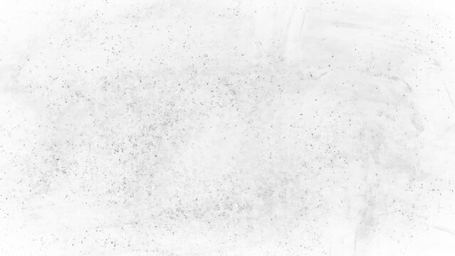 Gray and white textured background with small black specks and smudges