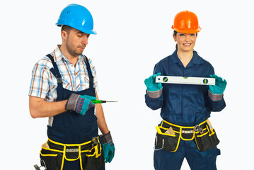Fototapeta premium Two workers stand ready for construction tasks