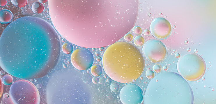 Fundo abstrato com bolhas coloridas em tons past&eacute;is e efeito macro art&iacute;stico