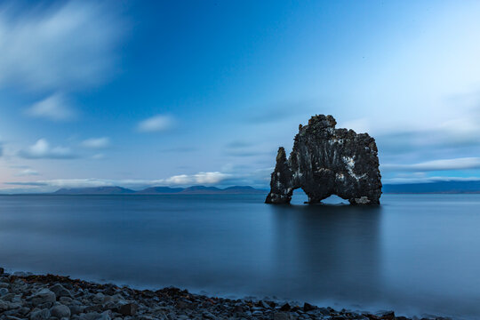 Rock formation in the middle of the water, Hvitserkur, Northern Iceland, long exposure motion blur