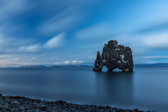 Rock formation in the middle of the water, Hvitserkur, Northern Iceland, long exposure motion blur