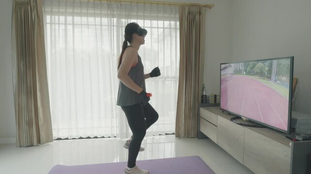 A person enjoys a virtual reality workout in their living room, blending technology and fitness. This modern approach emphasizes physical activity through immersive experiences, promoting a healthy li