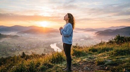 Woman breathing deeply at dawn, golden light touching her face, a feeling of peace