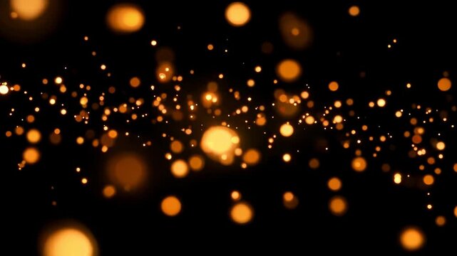 A dark background with a motion effect of numerous small and large orange lights scattered across, creating a sense of dynamic movement and energy.