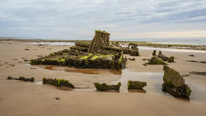 Stones on the beach and the ST Pasages Shipwreck between Ballasalla and Sartfield, Isle of Man © Bernd Brueggemann