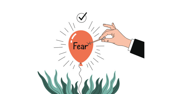 Hand uses a small needle to pop a red balloon with the word fear written on it to overcome anxiety and phobia.