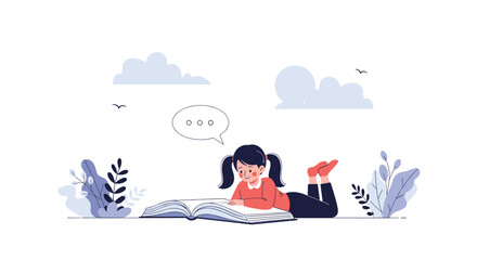 Obraz premium Little girl lies comfortably on her stomach on the floor while being completely absorbed in reading a large storybook.