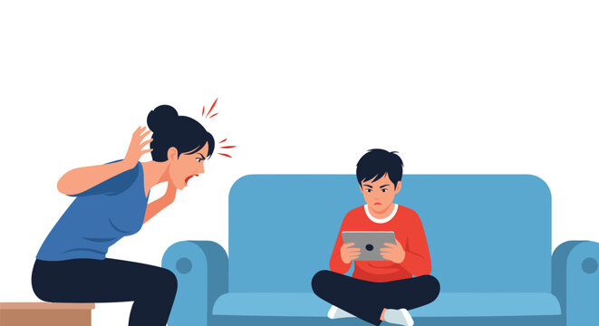 Frustrated mother shouts at her young son who is completely ignoring her while playing games on his digital tablet.