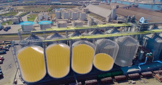 Grain Terminal System for Grain Storage and Transportation. Smart industry. Heavy Duty Hopper Bins. Grain storage and grain handling. Drone aerial view.