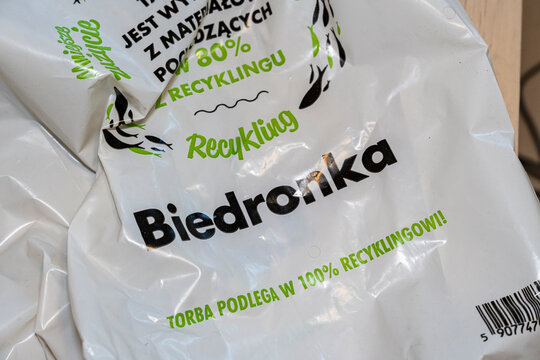 Warsaw, Poland - April 26, 2026: Recyclable bag from Biedronka convenience store promoting eco-friendly practices featuring bold graphic design and recycling messages