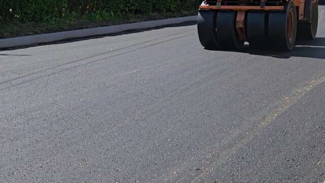 Construction works - Asphalting, rolling, street - (4K)