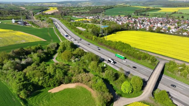 Idstein, Germany - April 23, 2026: Aerial view of dense traffic on German highway A3 between Bad Camberg and Idstein.