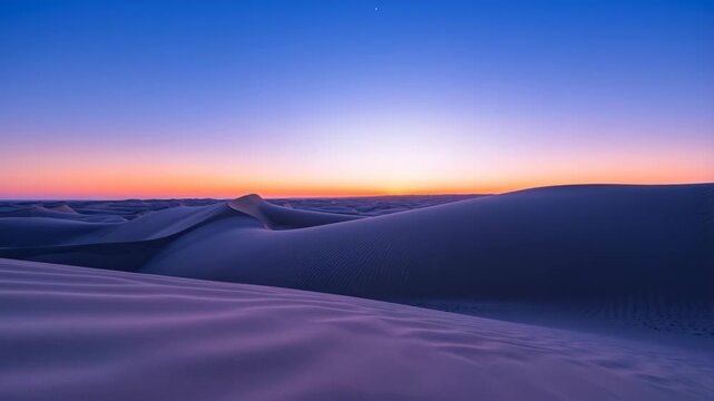 Time lapse footage of sunrise over desert sand dunes with vibrant pink, orange and purple sky against fading stars and rising sun on the horizon