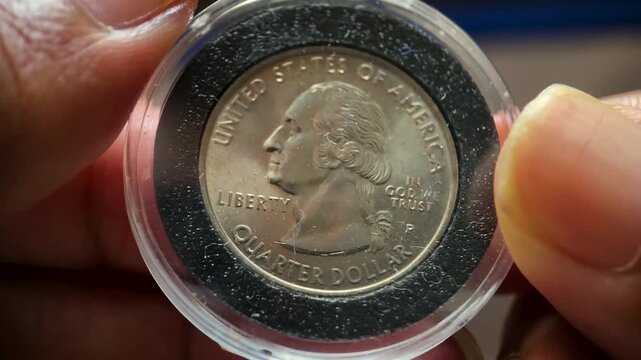 Macro Video of Physical Inspection of 1999 Washington Quarter Georgia State Coin
