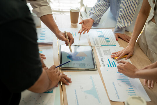 Investment Consultant,strategy,planning,Financial advisor and accounting concept.Group of business adviser meeting to analyze and discuss the situation on the financial report workplace office.
