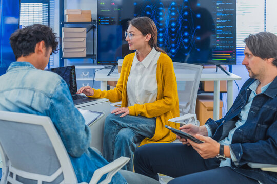 Professional Female Specialist Explaining Advanced AI Neural Network Data to Tech Team in Modern Office