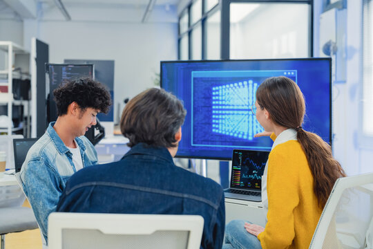 Diverse Tech Team Collaborating and Discussing Project Strategy During Coffee Break in Modern AI Office