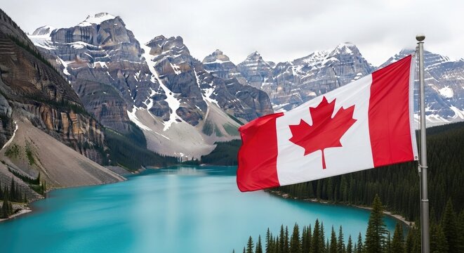 Canadian flag waving against rocky mountain and turquoise lake backdrop