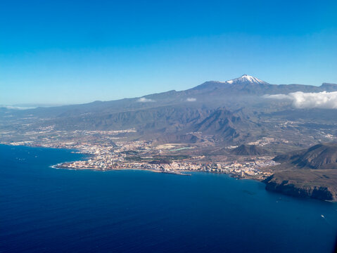 Approaching Tenerife South Airport. In the background is Mount Teide, partially covered in snow.