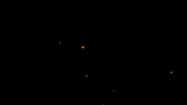 Fire sparks particle overlay on black background for cinematic video effects