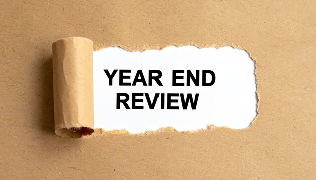 Torn Paper Revealing Year End Review Text Showcasing Reflection, Evaluation, and Conceptual Photography Design