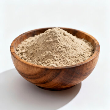 Natural Multani Mitti Powder in Wooden Bowl Isolated on White &ndash; Herbal Cosmetic Clay Ingredient