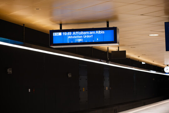 Zurich, Switzerland, April 20, 2026. A digital S14 train departure display for Affoltern am Albis at an empty Zurich HB platform