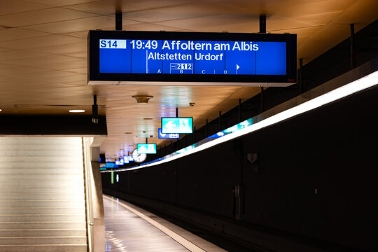 Zurich, Switzerland, April 20, 2026. A digital S14 train departure display for Affoltern am Albis at an empty Zurich HB platform