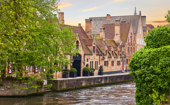 Bruges Belgium. Old town with vintage medieval houses by the channel. Picturesque landmark in Europe.