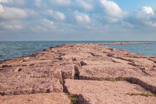 granite pier to break water from the Gulf