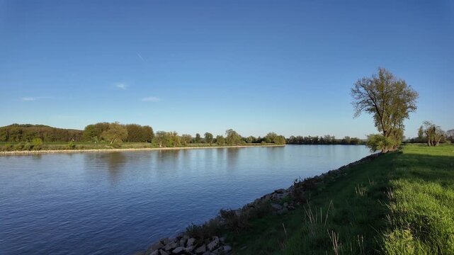 Calm evening scene on Danube river near Winzer Bavaria with spring landscape and peaceful water view