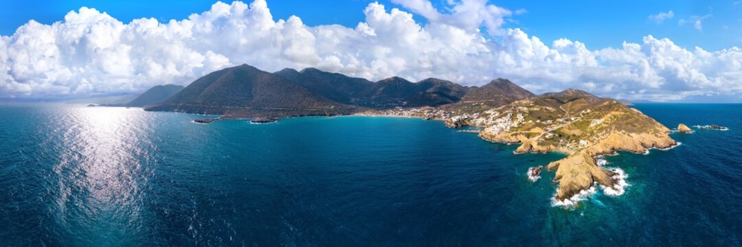 Greece Crete 16k panorama of Bali village coastline and rocky peninsula. Scenic Mediterranean sea view with mountains in background. Authentic Greek island travel landscape and turquoise water